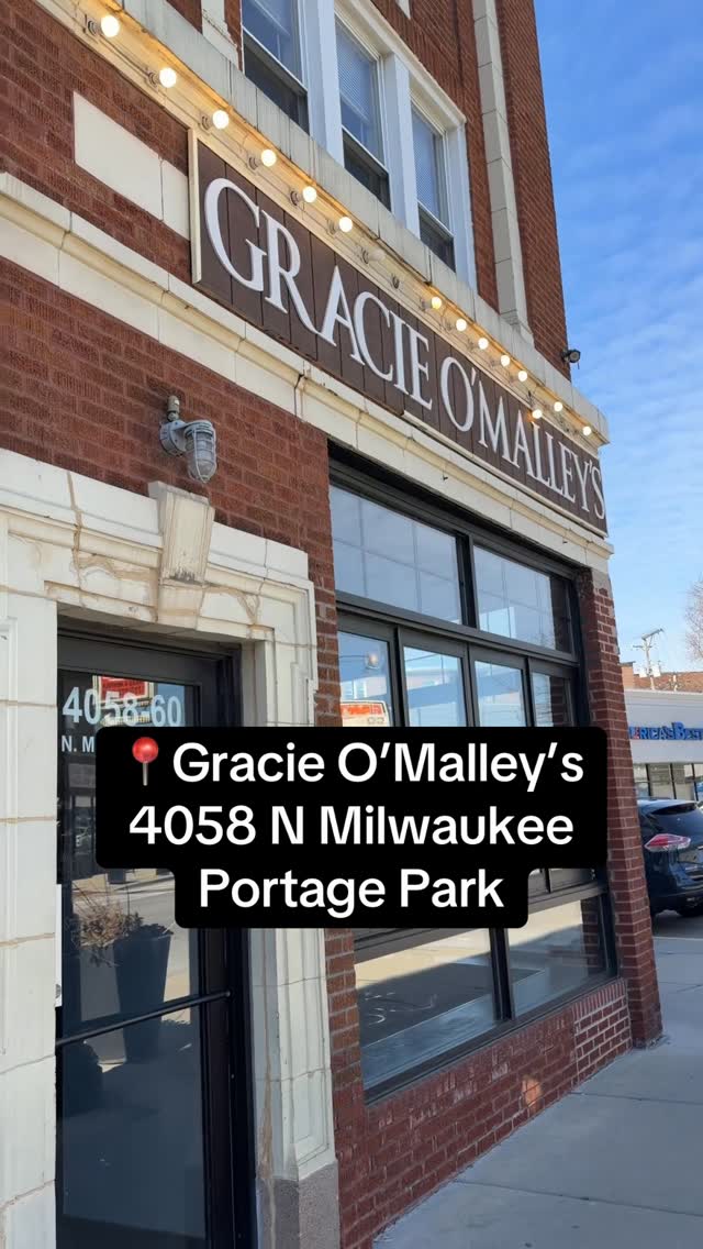 The brick façade and marquee sign of Gracie O'Malley's at 4058 N Milwaukee Ave